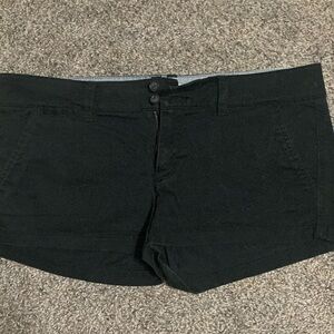 Black AE stretch material shorts. Size 8